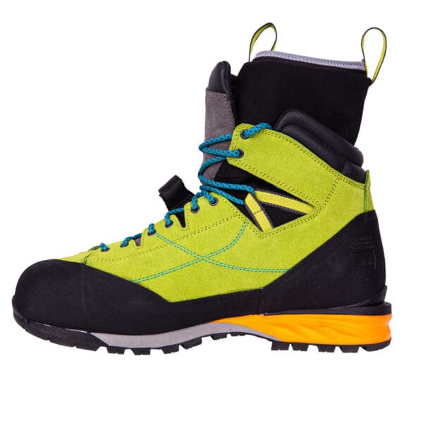 Green and black hiking boot with orange sole.