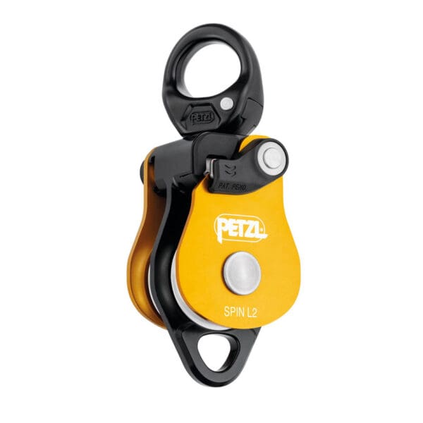 Yellow and black Petzl Spin L2 pulley.