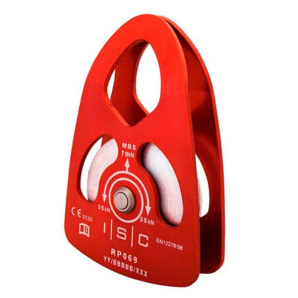 Red climbing pulley with white wheel.