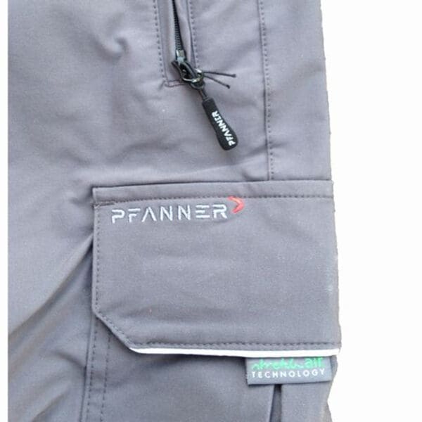 Grey work pants with a pocket.