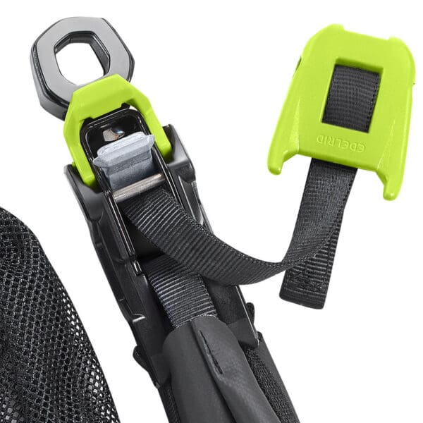 Black safety strap with green buckle.