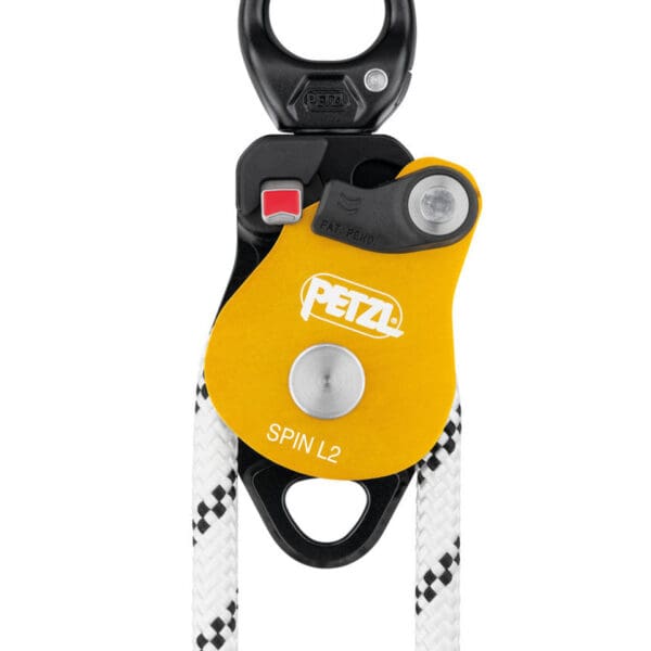 Yellow Petzl Spin L2 pulley with rope.