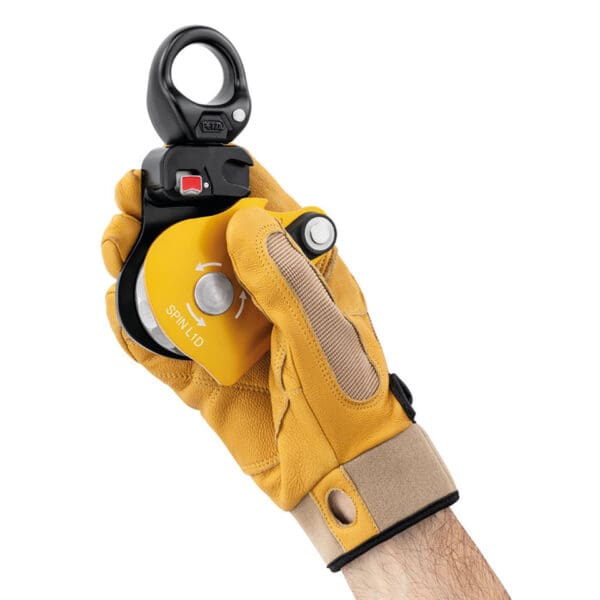 Yellow and black safety equipment in hand.