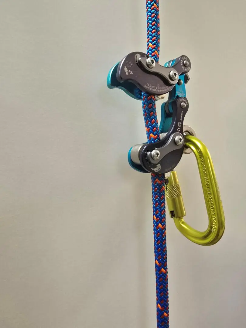 Climbing rope with ascender and carabiner.